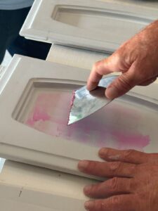 surface prep work on cabinet door