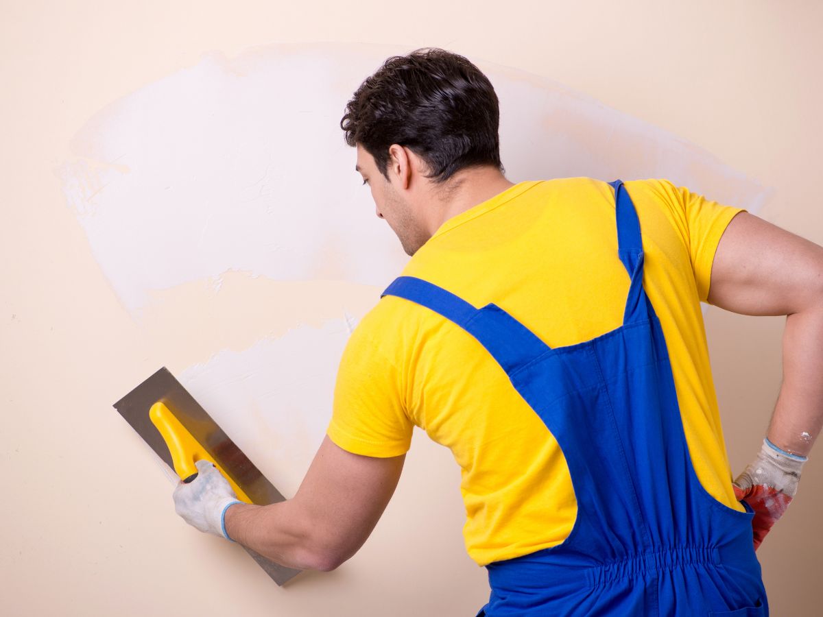 painter man in yellow